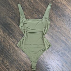 Olive green square bodysuit in size Large.